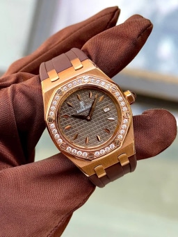 Brown Dial with extra new rubber strap & extract from archives, image 1 Brown Dial with extra new rubber strap & extract from archives, image 1